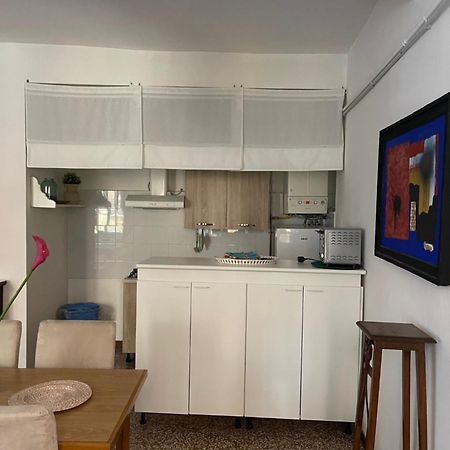 Bilocale Inzani Apartment Parma Bagian luar foto